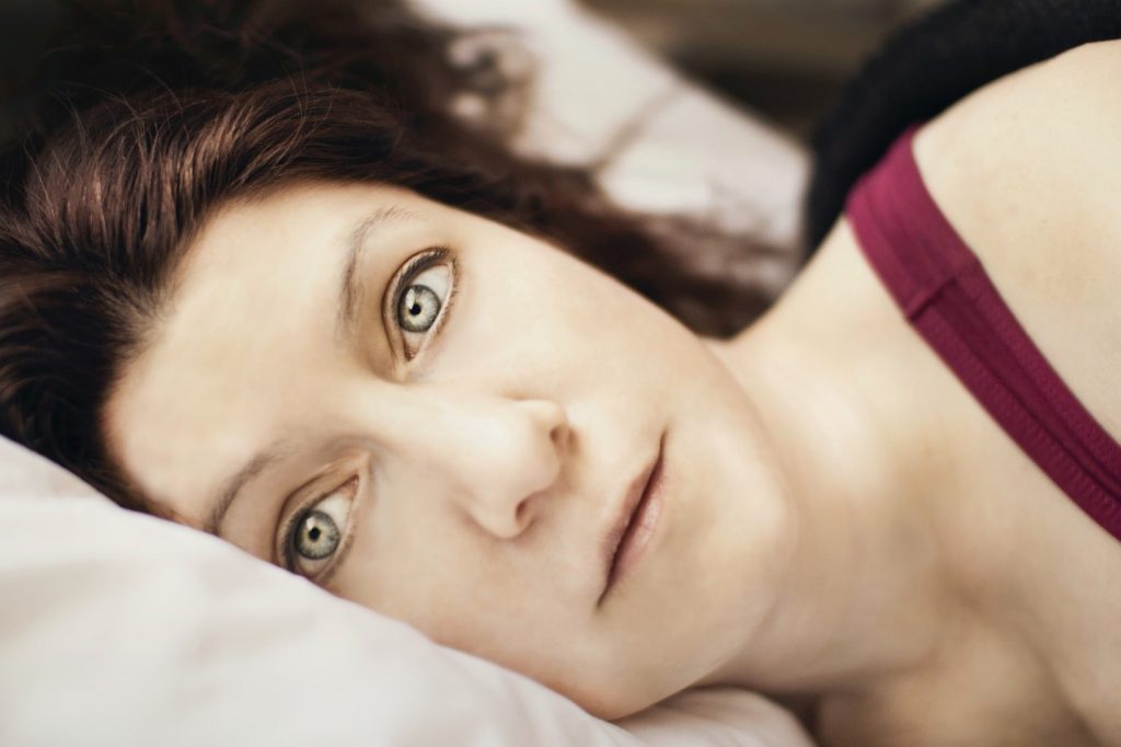 Stay at Home Organic Skin Care Routine 4 A close up of a woman lying on a bed