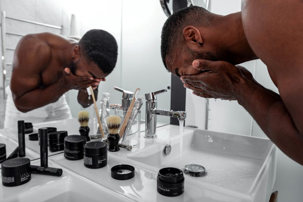 Stay at Home Organic Skin Care Routine 6 Man cleansing his face