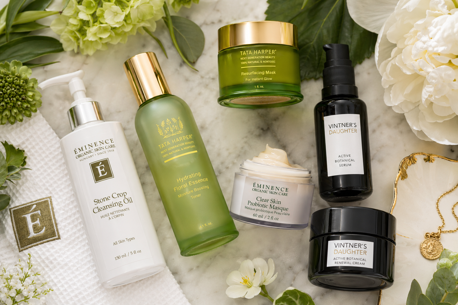 Luxury organic skincare brands including Eminence Organics, Tata Harper, and Vintner's Daughter displayed in a bright, natural setting.