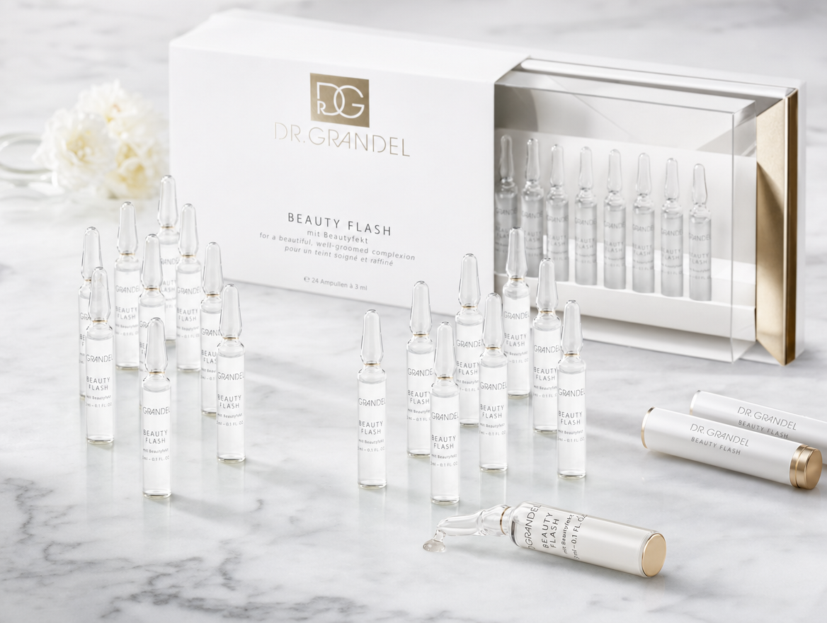 Dr. Grandel Beauty Flash Ampoule 24-pack arranged on white marble, German professional skincare